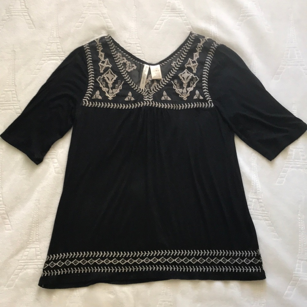 Black top with gold detail